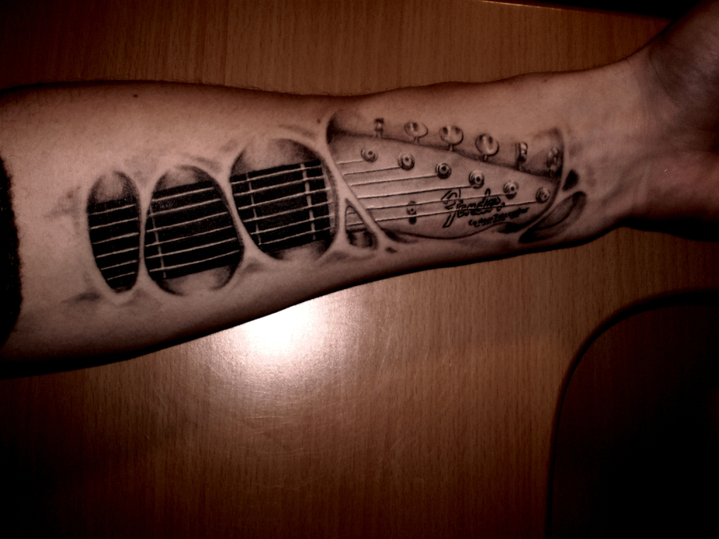 20 Guitar Tattoo Images Pictures And Ideas inside proportions 1024 X 768