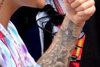 A Complete Guide To All 56 Of Justin Biebers Tattoos for size 999 X 1498
