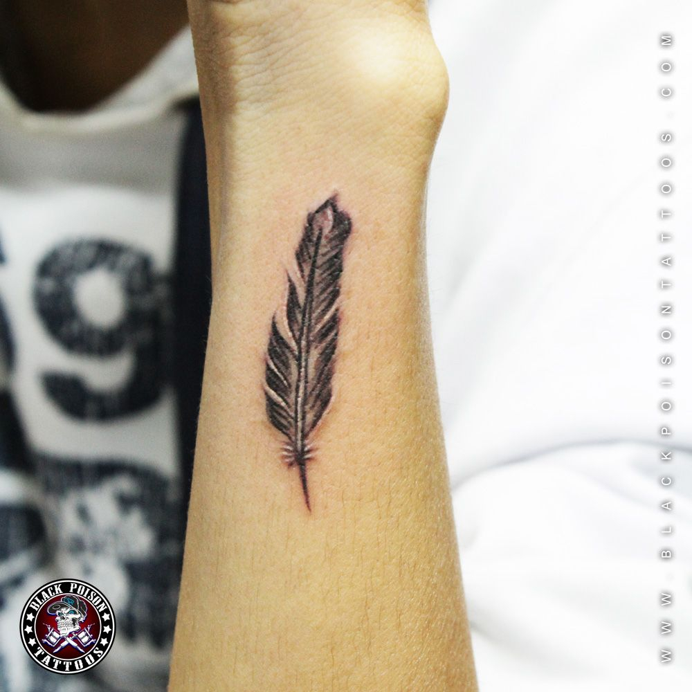 Above Is Very Small Feather Tattoo On Arm Of A Girl Tattoos Are in dimensions 1000 X 1000
