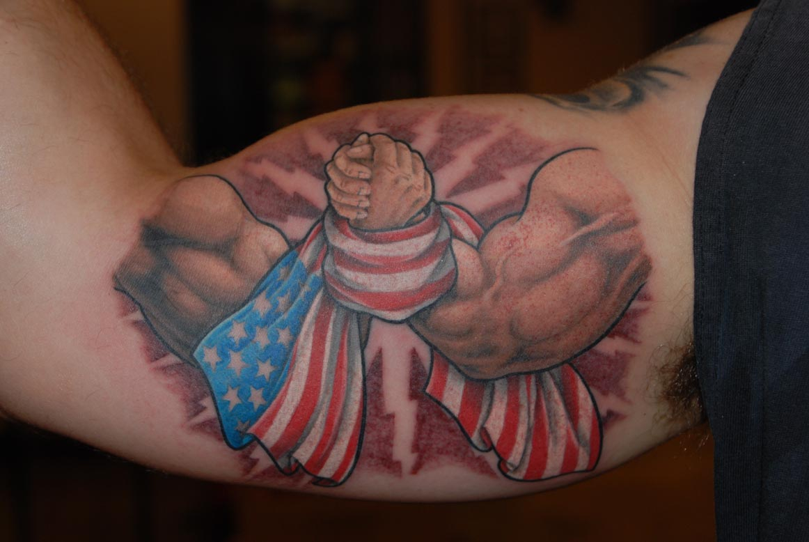 Arm Wrestling With Usa Flag Tattoo On Bicep in size 1162 X 778