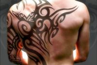 Attractive Tribal Design Tattoo On Back And Half Sleeve For Men intended for proportions 1024 X 970