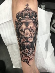 Black Ink Crown On Lion Head Tattoo On Left Arm with measurements 1152 X 1536