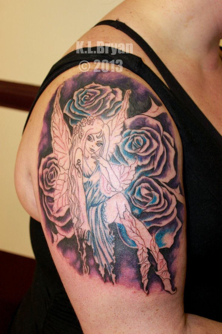 Black Ink Fairy With Roses Tattoo On Women Right Upper Arm Fairy for dimensions 730 X 1095