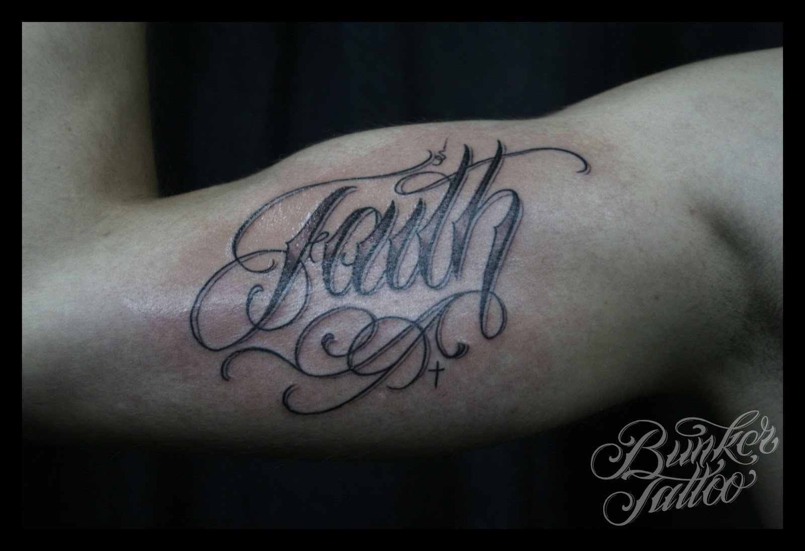 Black Ink Faith Lettering Tattoo On Right Bicep intended for sizing 1600 X 1096