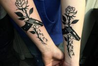 Black Karma Rose Thorns And Gun Silhouette Tattoo On Inner Forearm with regard to proportions 1080 X 1080