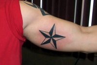 Black Nautical Star Tattoo On Inner Bicep within proportions 946 X 861