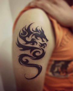 Black Tribal Dragon Tattoo On Upper Left Arm For Men within measurements 819 X 1024