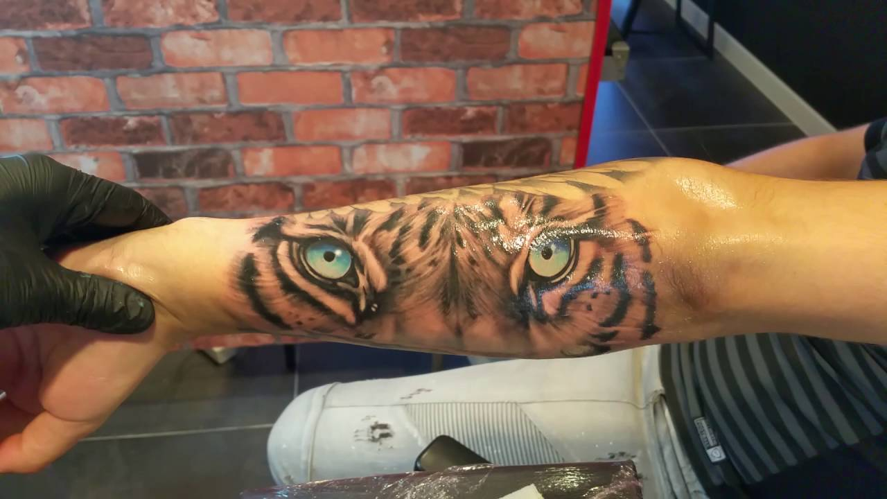Blue Tiger Eyes Tattoo On Forearm with regard to proportions 1280 X 720