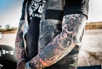 Cropped Close Up Of Mature Male Motorcyclist With Tattooed Arms within sizing 1200 X 798