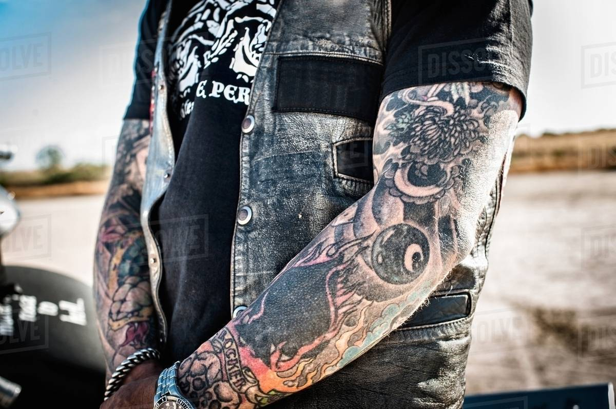 Cropped Close Up Of Mature Male Motorcyclist With Tattooed Arms within sizing 1200 X 798