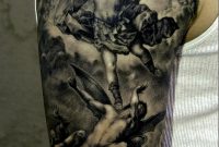 Fighting Archangel Religious Tattoo On Upper Arm Tattoos Photos regarding proportions 800 X 1275