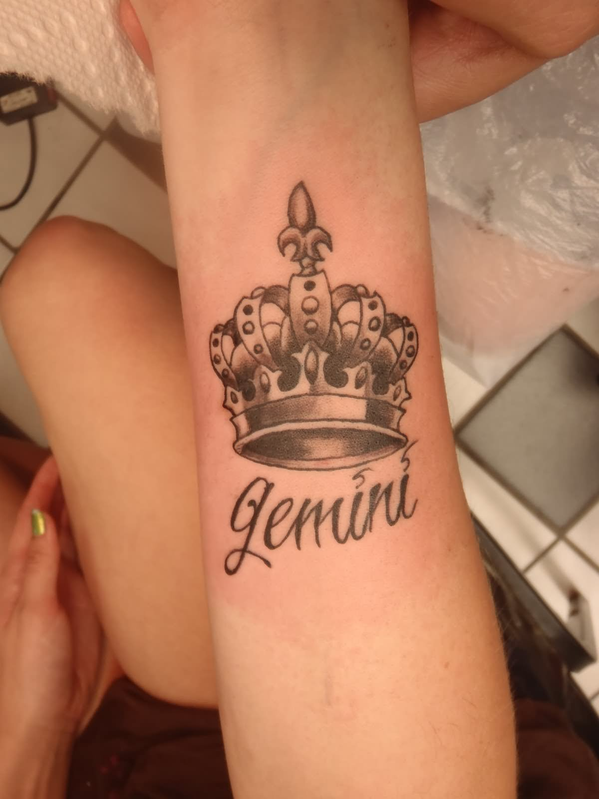 Gemini Black Ink King Crown Tattoo On Forearm with proportions 1200 X 1600