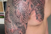 Grey Ink Dragon Tattoo On Chest And Shoulder for size 1200 X 1600
