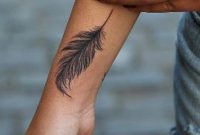 Indian Plume Feather Tattoo Ideas For Women Black Arm Wrist Tat in sizing 953 X 1500