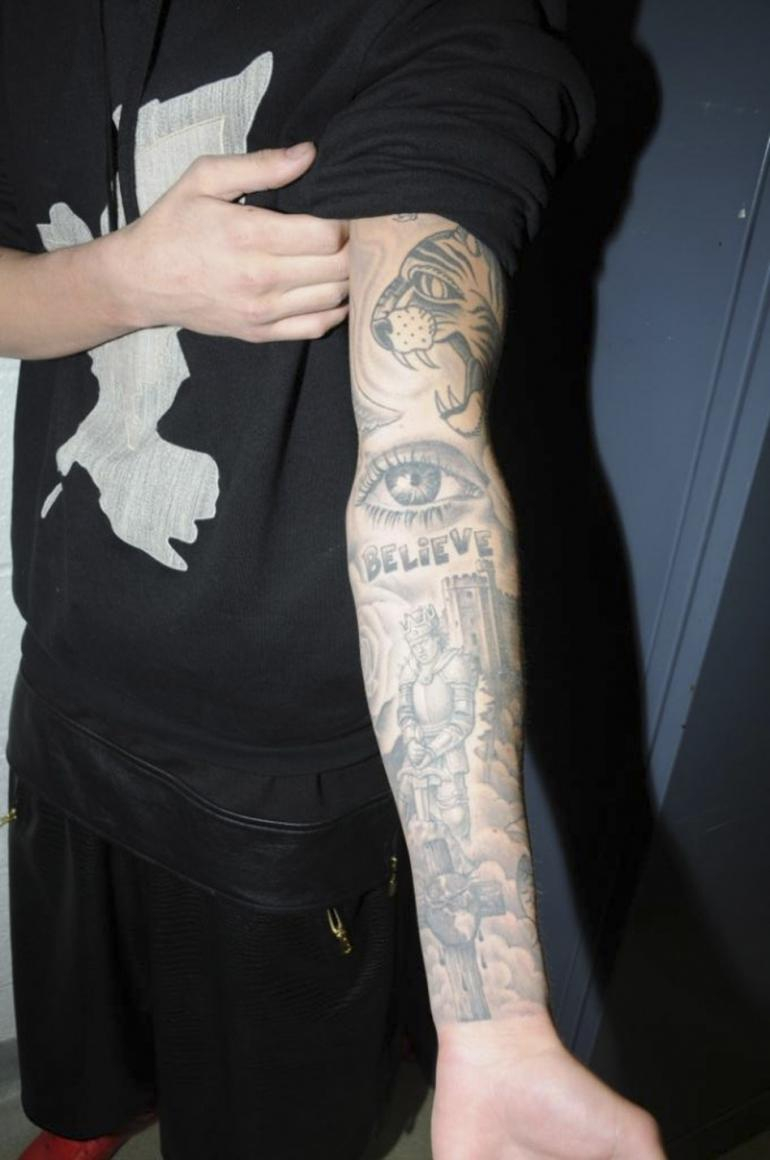Justin Biebers Tattoos Its Meanings Photos with measurements 770 X 1160
