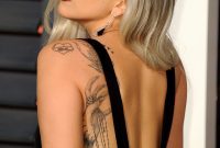 Lady Gaga Tattoos Meanings Explained Billboard regarding proportions 1240 X 1864