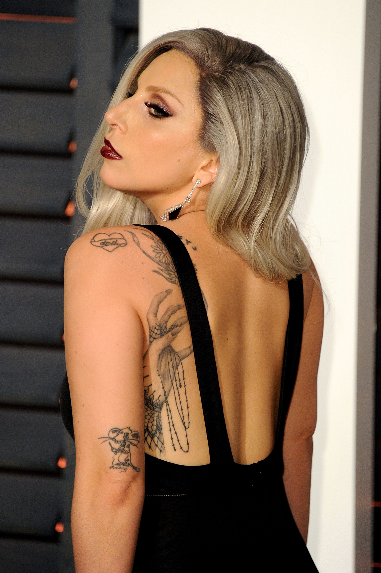 Lady Gaga Tattoos Meanings Explained Billboard regarding proportions 1240 X 1864