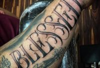 Lettering Tattoo Saying Blessed On The Right Forearm within sizing 1000 X 1000