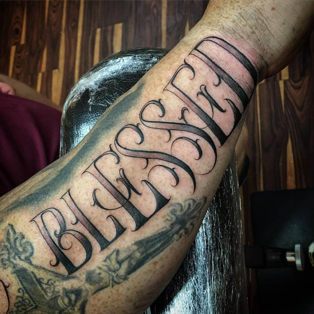 Lettering Tattoo Saying Blessed On The Right Forearm within sizing 1000 X 1000