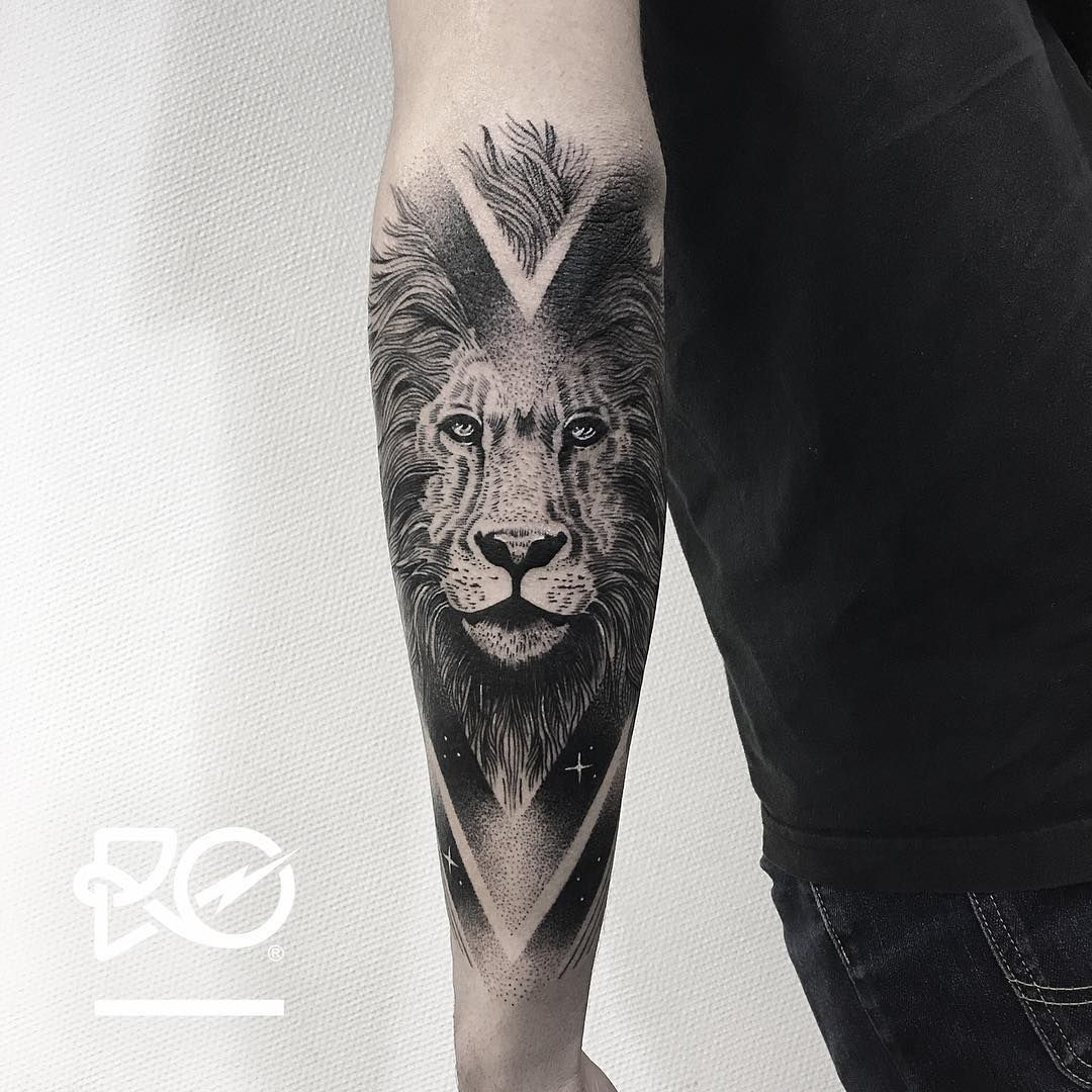 free lower arm lion tattoos