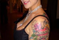 Lovely Women Show Amazing Red Rose And Heart Tattoo On Upper Arm in size 1024 X 1024