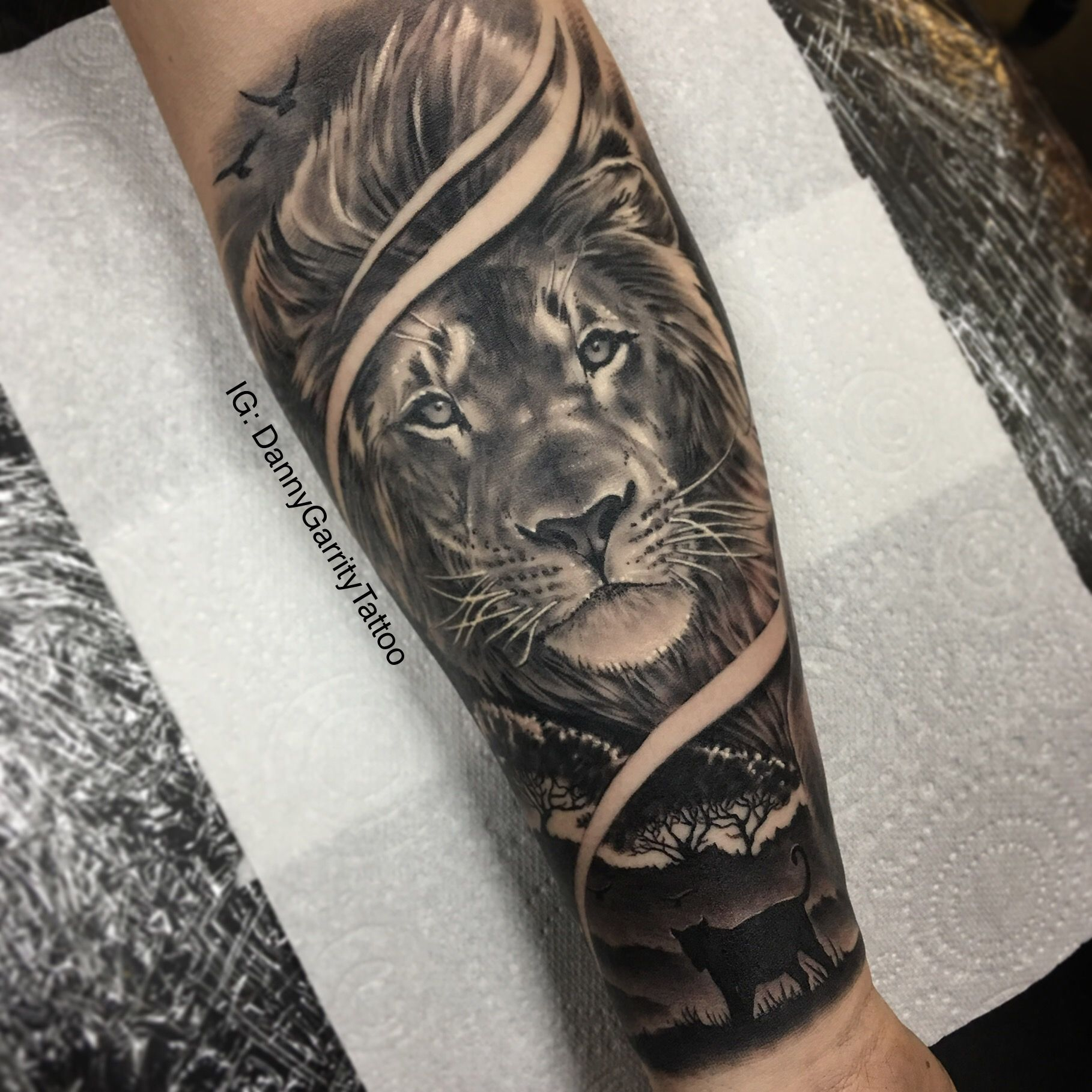 Mens Forearm Sleeve Tattoo Lion With Silhouette In Realism for size 1818 X 1818
