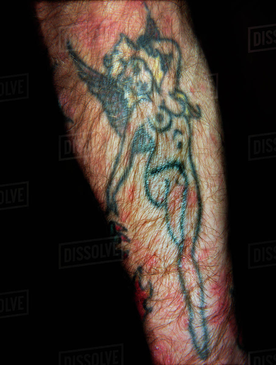 Naked Angel Tattooed Onto Mans Hairy Arm Stock Photo Dissolve throughout dimensions 907 X 1200