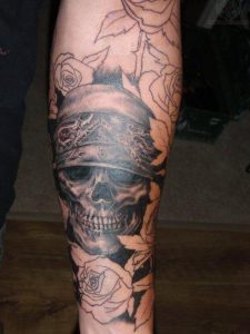 Outline Roses And Pirate Skull Tattoo On Arm Sleeve intended for size 800 X 1067