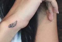 Simple Small Wrist Tattoo Ideas Hidden Angel Wing Symbol Arm within sizing 1231 X 2048