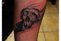 Small Grim Reaper Skull Tattoo On Arm with dimensions 900 X 1273