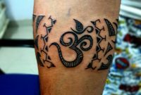 Traditional Arm Band Tattoo With Om Done At La Nina Tattoos intended for measurements 1080 X 1350