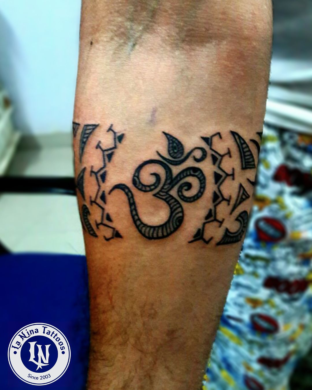 Traditional Arm Band Tattoo With Om Done At La Nina Tattoos intended for measurements 1080 X 1350