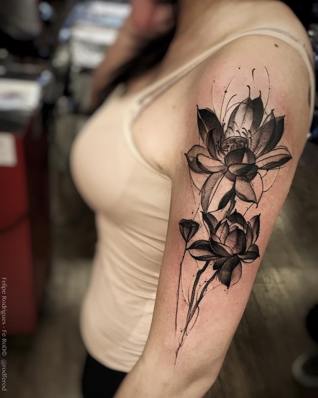 Unique Black Ink Lotus Flower Tattoo On Women Left Half Sleeve with regard to sizing 1080 X 1349