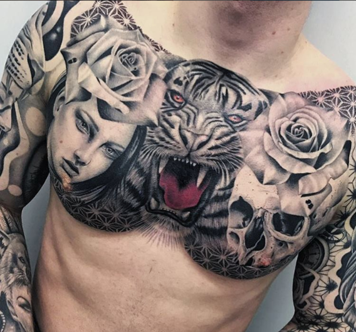 20 Killer Chest Tattoos Tattoo Ideas Artists And Models regarding measurements 1200 X 1117