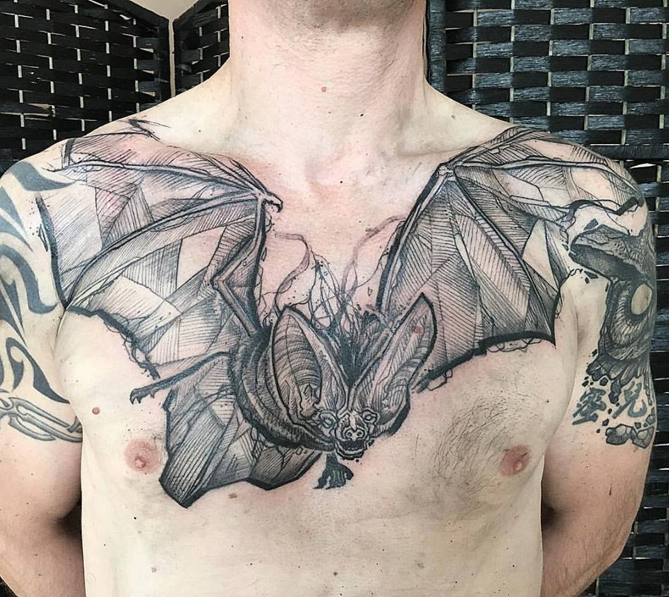 Abstract Black Ink Flying Bat Tattoo On Man Chest in size 960 X 857