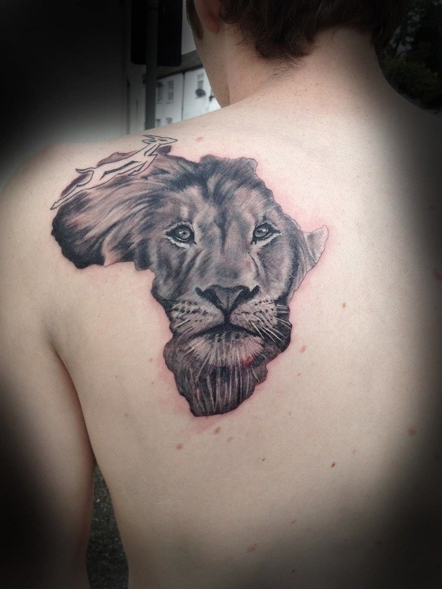 African Lion Face Tattoo On Man Back Swagu Lion Tattoo Africa for measurements 900 X 1200