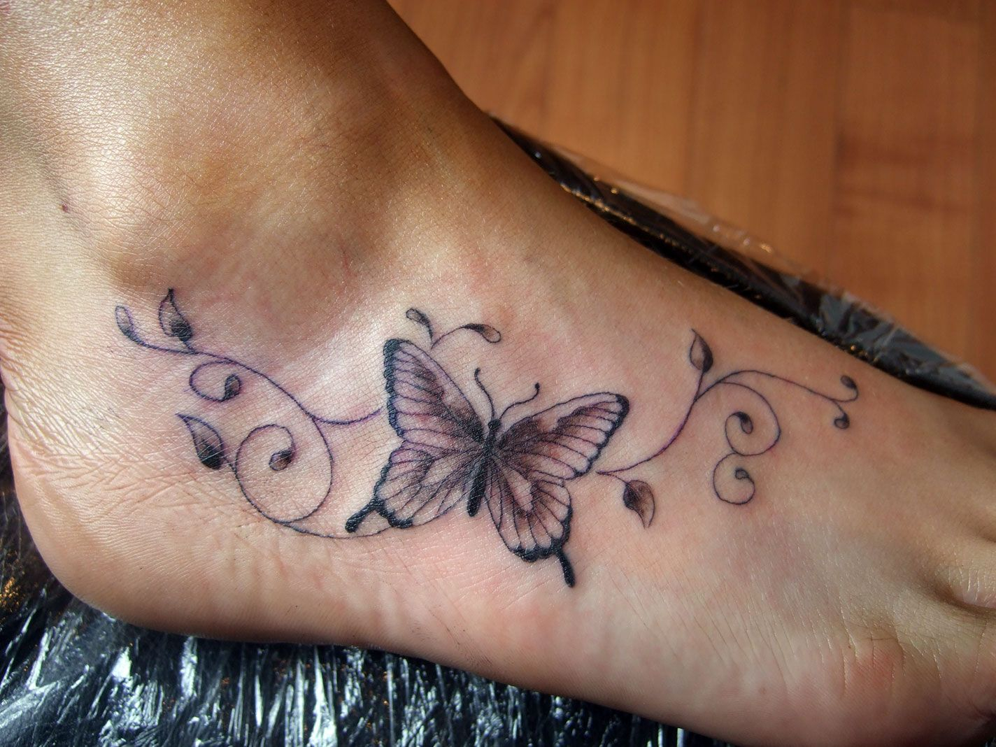 Awesome Butterfly Tattoos On Foot Design Stylendesigns within measurements 1424 X 1068