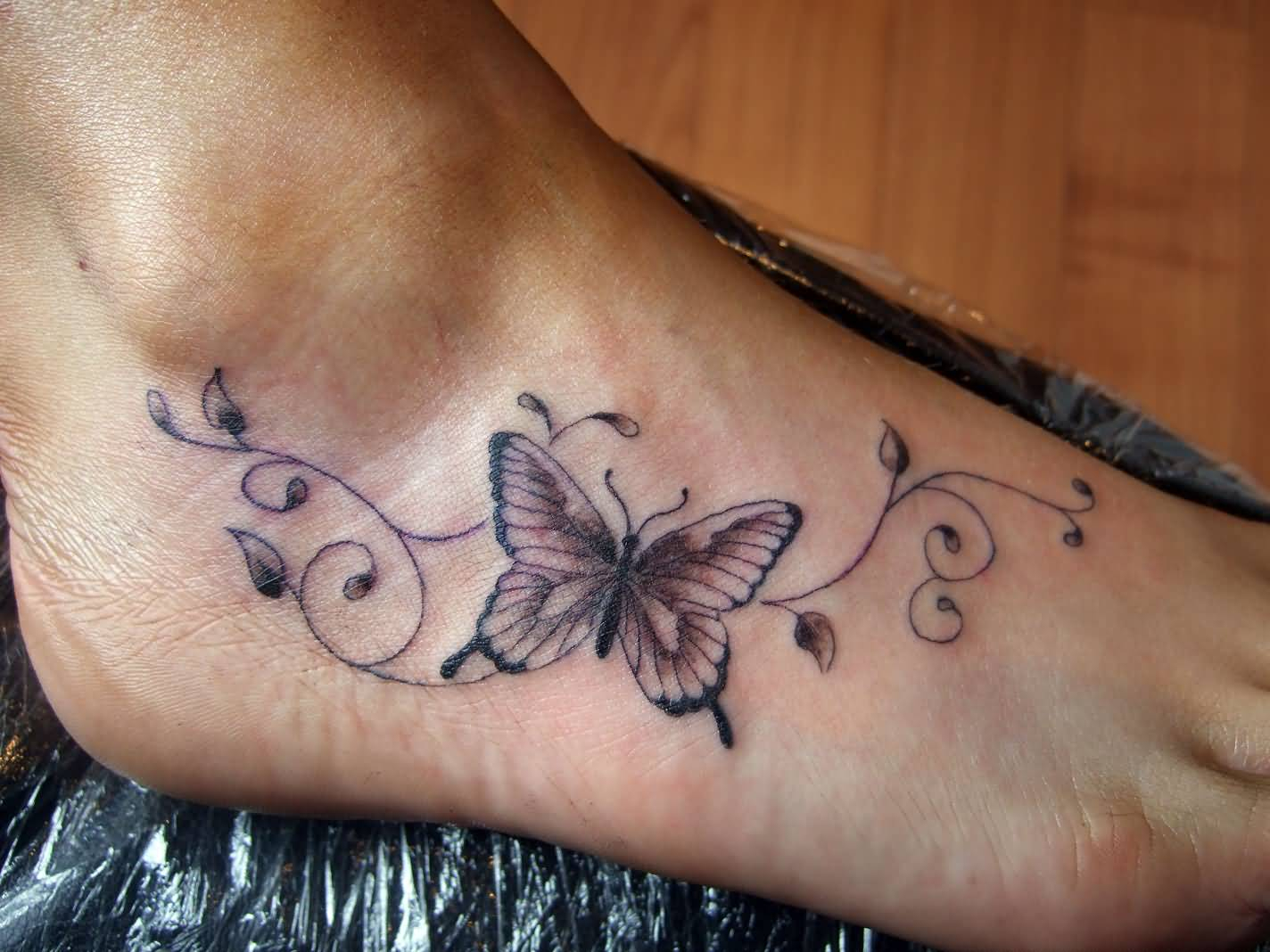 Black And Grey Butterfly Foot Tattoo for dimensions 1424 X 1068