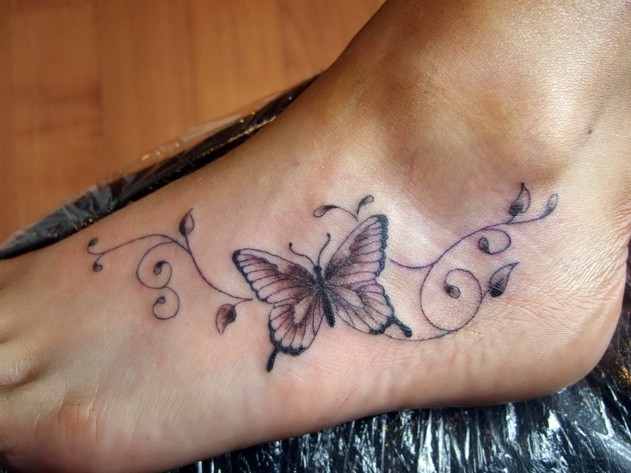 Butterfly Tattoo Design On Girl Foot with size 1270 X 952