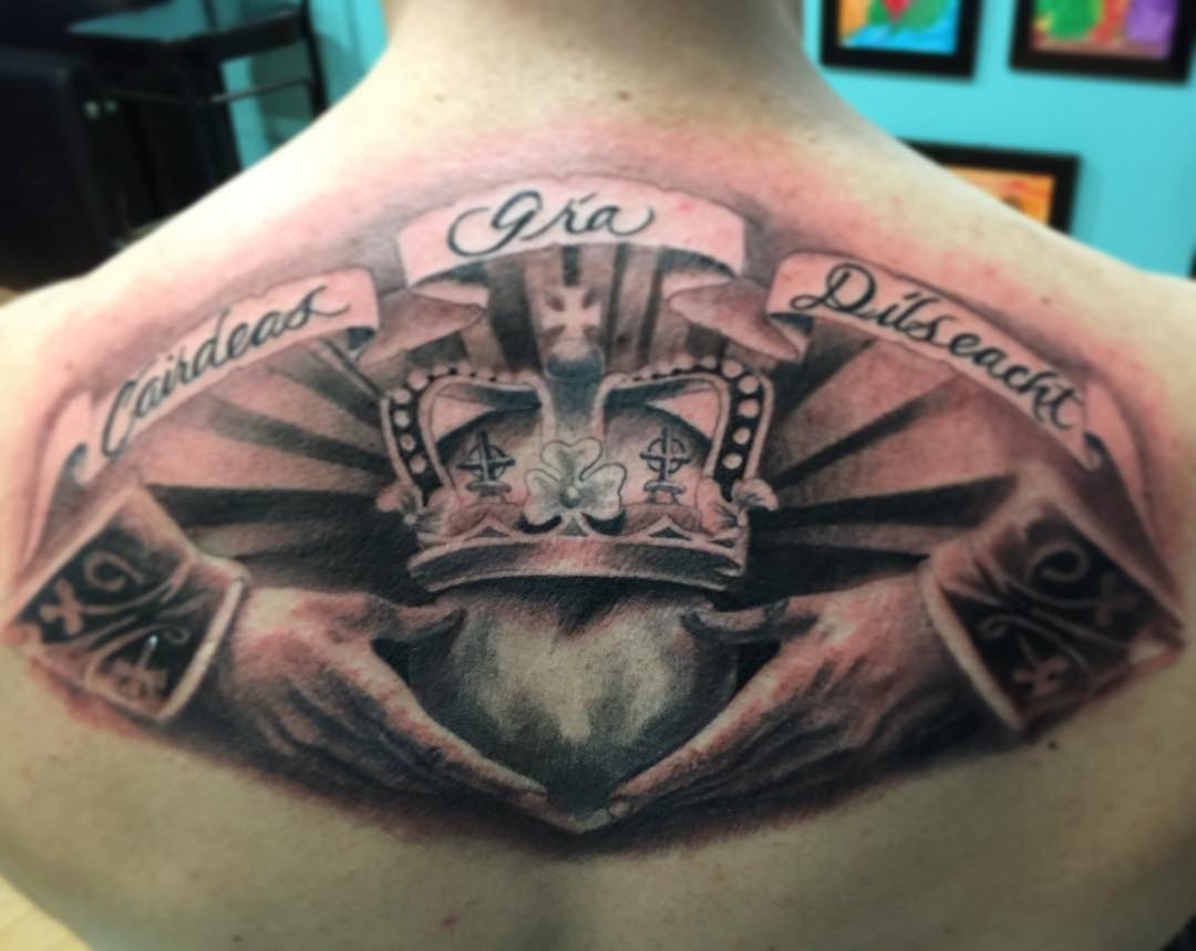 Claddagh Irish Tattoo On Man Upper Back intended for proportions 1080 X 859