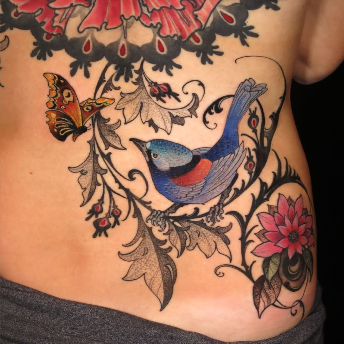 Colorful Bird On Branch With Flying Butterfly Tattoo On Lower Back regarding sizing 1156 X 1156