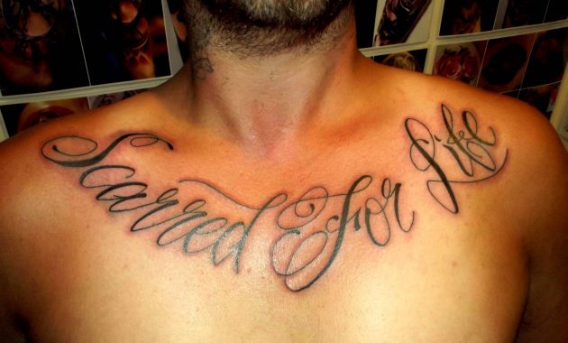 3. "Cursive Writing Chest Tattoos" - wide 2