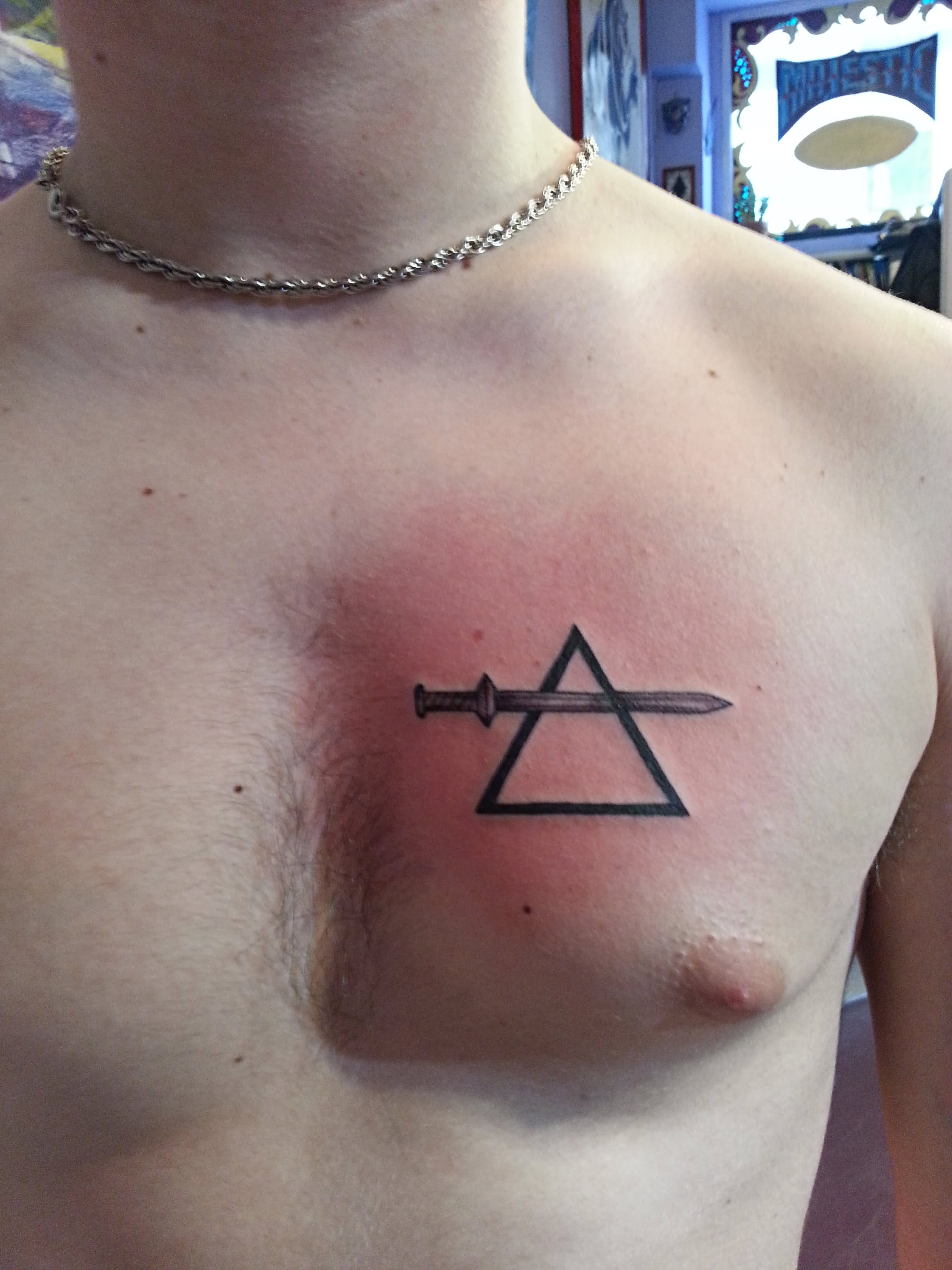 Dagger Triangle Tattoos On Man Chest within proportions 2448 X 3264