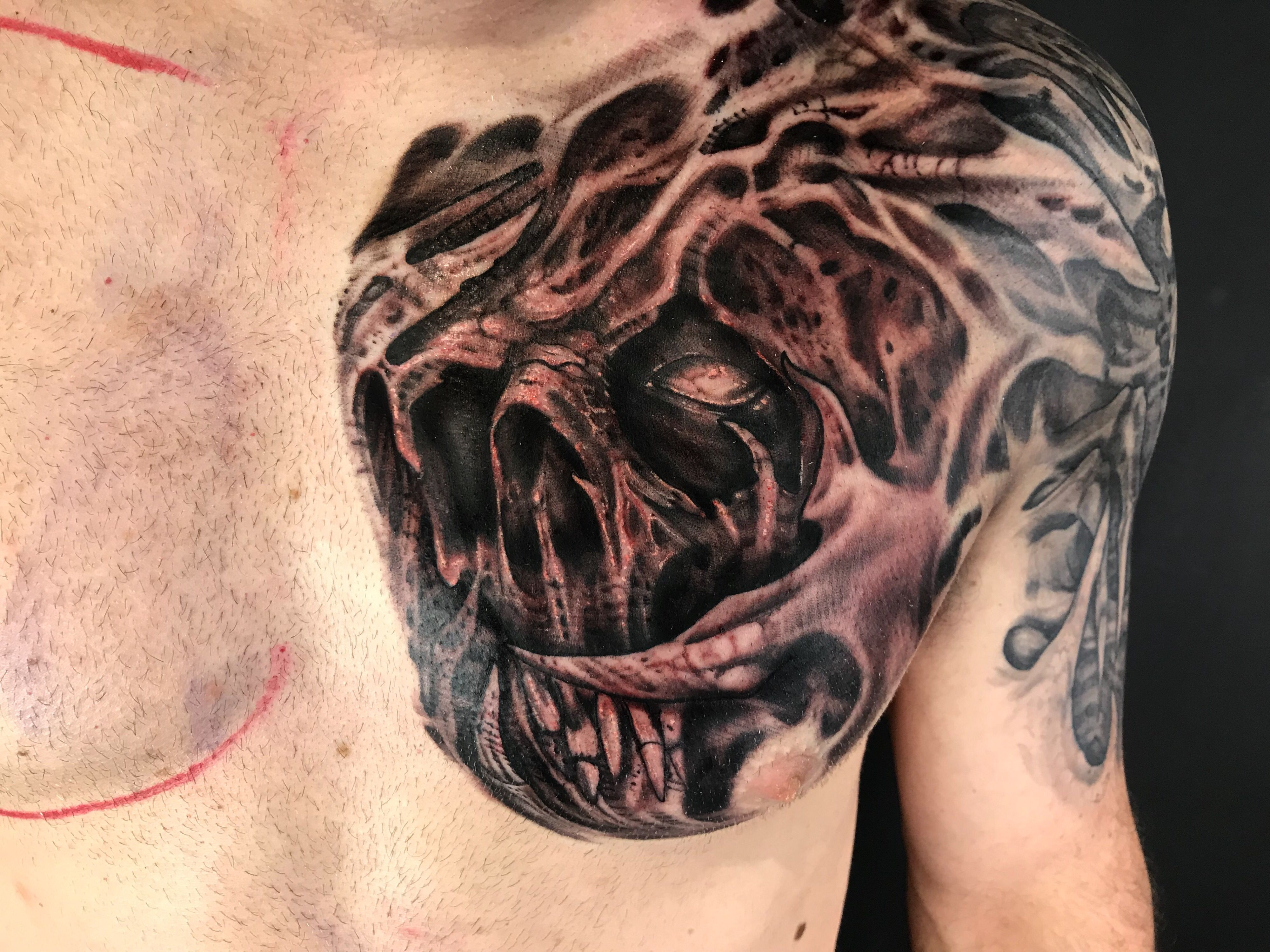 Freehand Biomechbioorganic Skull Tattoo On Clients Chest Black And within size 4000 X 3000