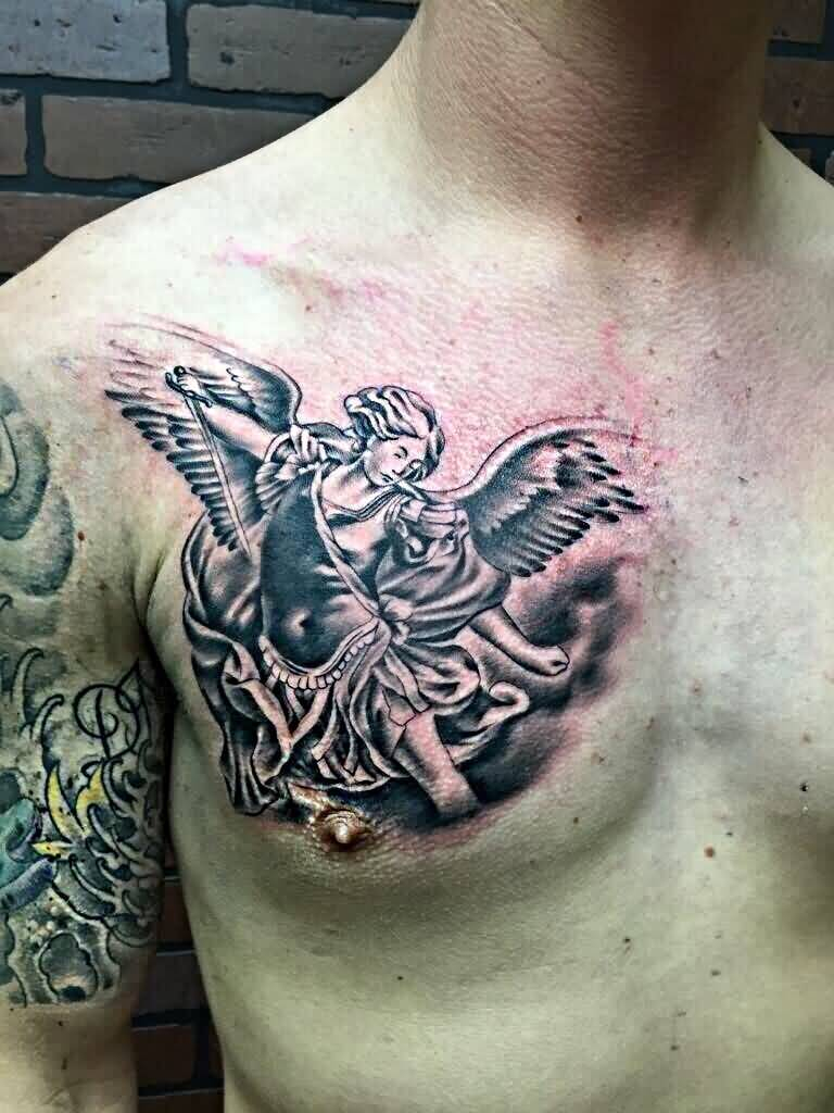 Grey Ink Archangel Tattoo On Man Right Chest with regard to size 768 X 1024