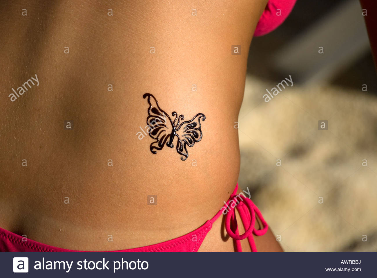 Henna Butterfly Tattoo On Girl In Red Bikini Stock Photo 16640309 regarding proportions 1300 X 957