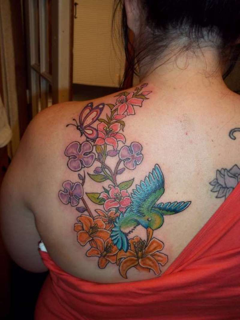 Hummingbird Lilies Butterfly And Orchids Tattoo On Back Tattoos regarding dimensions 800 X 1067