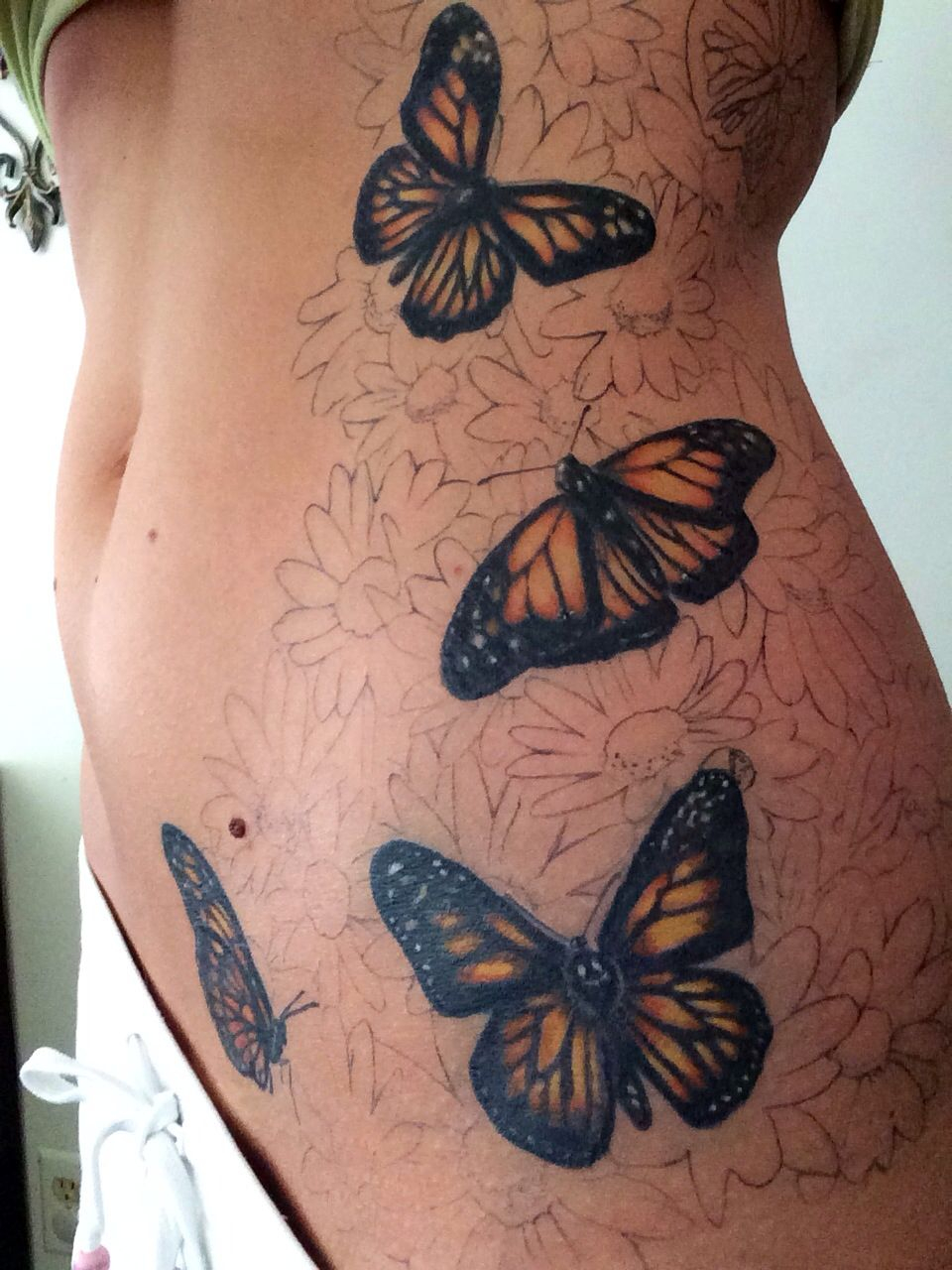 Loving My Rib Tattoo With Butterflies And Daisies 3 Tattoos throughout proportions 960 X 1280