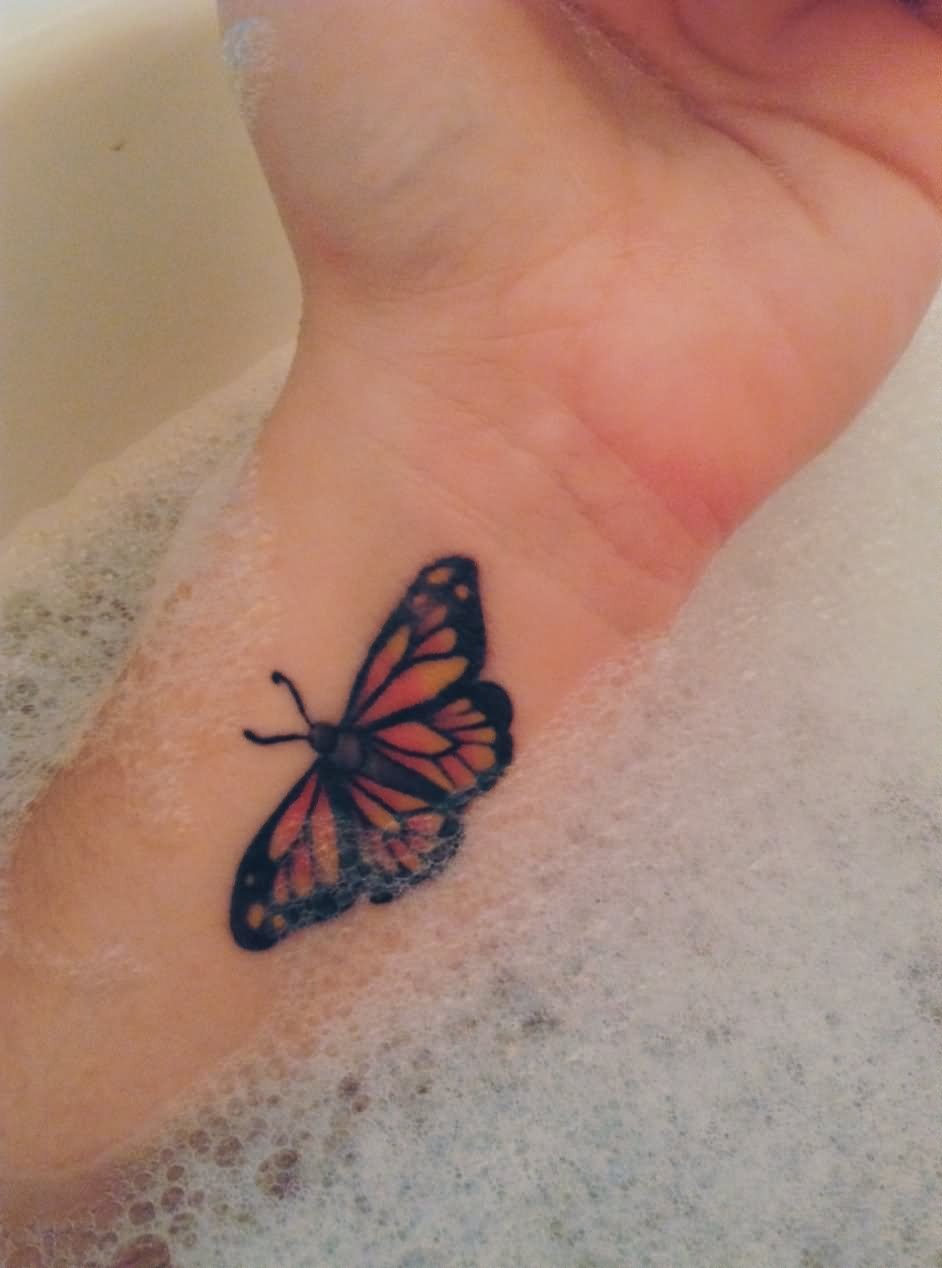 Monarch Butterfly Tattoo On Left Wrist for dimensions 942 X 1268