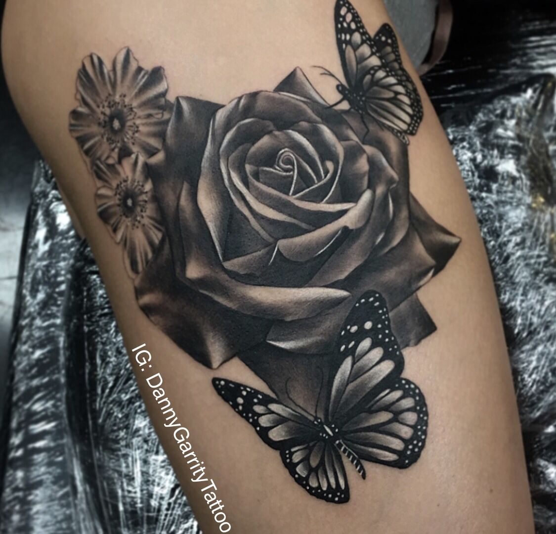 Realistic Black And Grey Rose Tattoo On A Thigh With Butterfly This intended for size 1125 X 1080